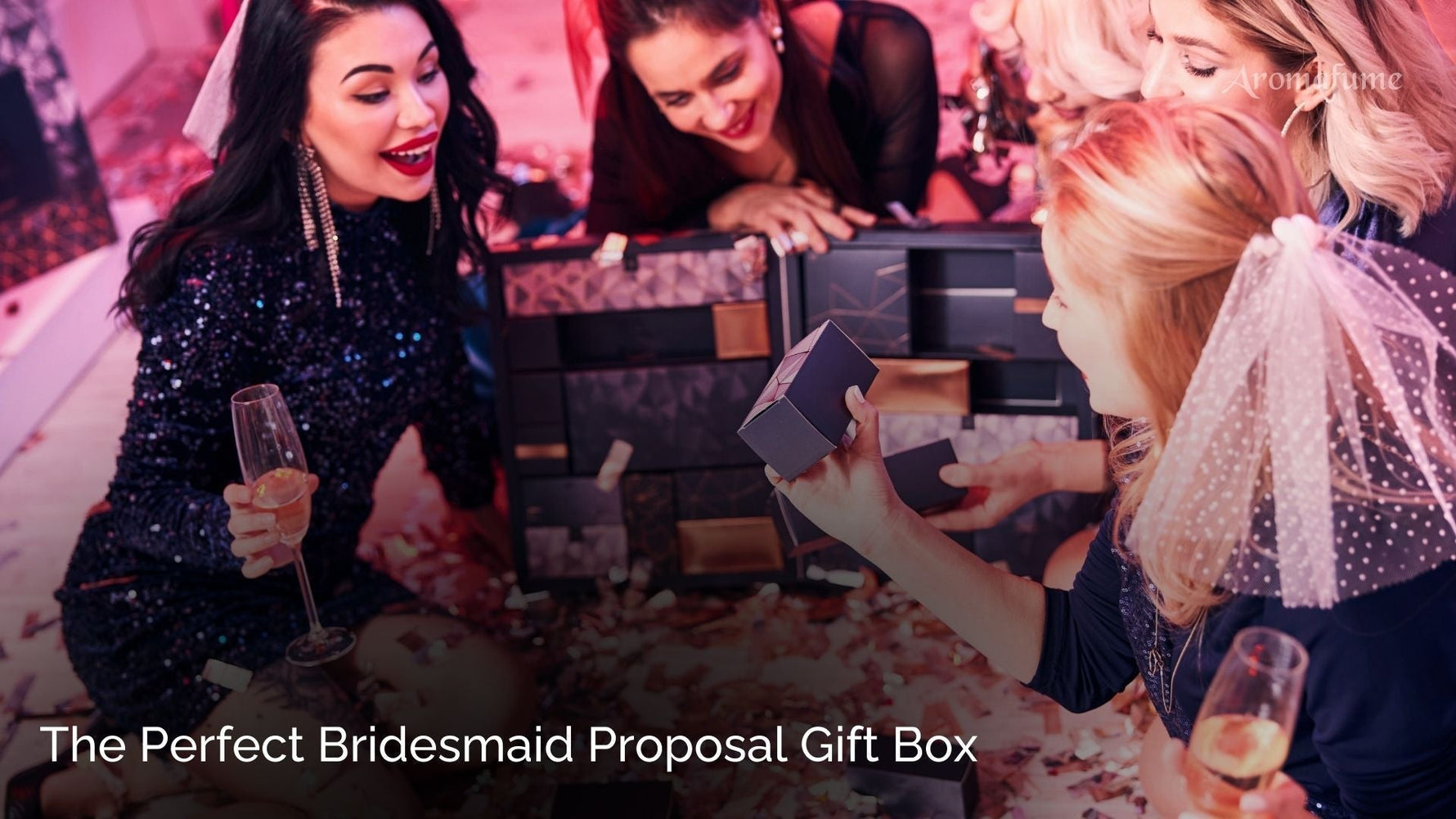 A group of bridesmaids holding beautifully curated gift boxes with the text "The Perfect Bridesmaid Proposal Gift Box" displayed.