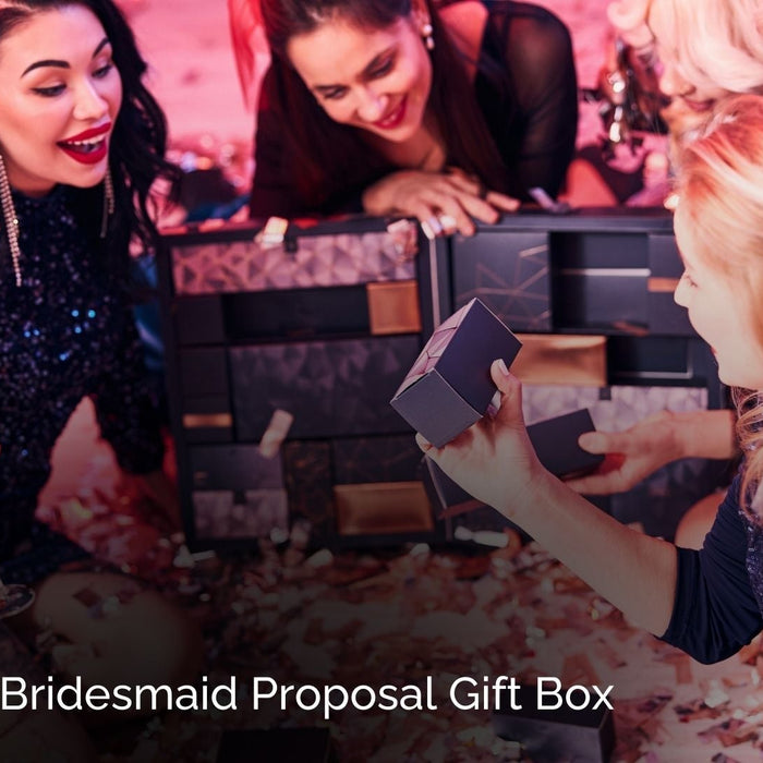 A group of bridesmaids holding beautifully curated gift boxes with the text "The Perfect Bridesmaid Proposal Gift Box" displayed.